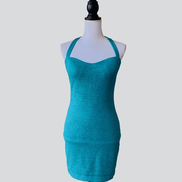 OFF  BEBE TEAL BODYCON RIBBED CUTOUT MINI DRESS - Picture 2 of 15